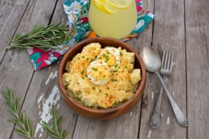 deviled egg potato salad on a wooden table